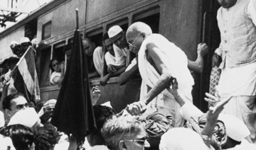 National Congress Party leader Mahatma Gandhi, center, disembarks from a train in Bombay, India. (AP file photo)