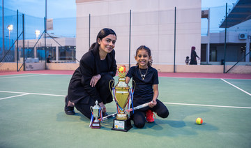Sama Al-Bakr poses with a trophy. (AN photo by Nisar Illikkottil)