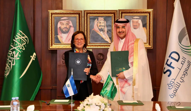 Sultan bin Abdulrahman Al-Marshad signed the agreement with Alexandra Hill Tinoco in Riyadh. (SPA)